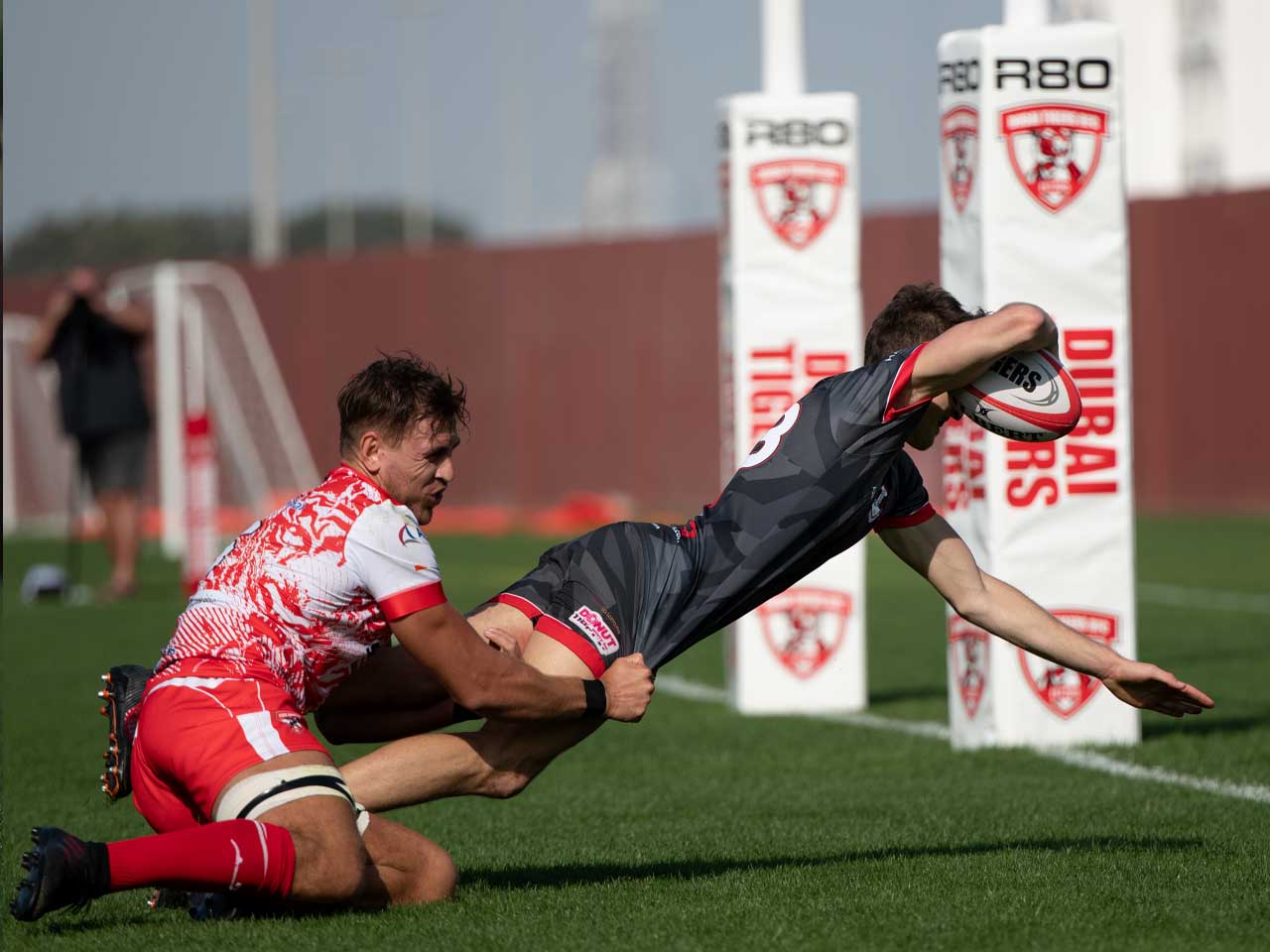 Teenager Hannes Kruger scoring another Exiles try against Dubai Tigers
